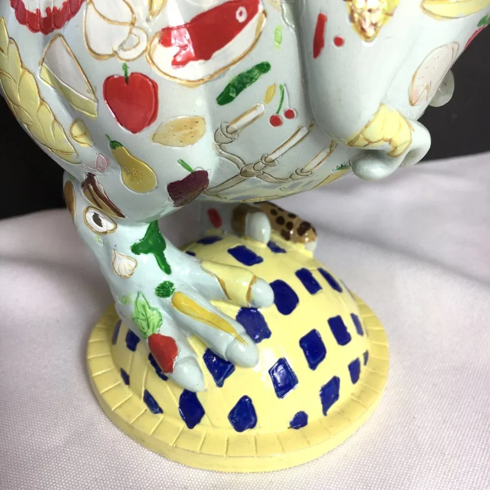 Dinosaur Figure Painted with fish lobster vegetables